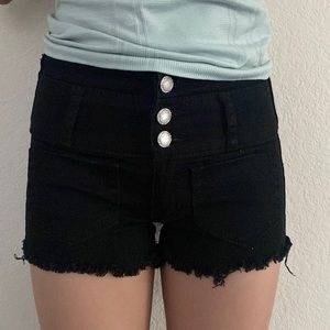 Black jean shorts, distressed edge, Almost Famous brand. Size 0